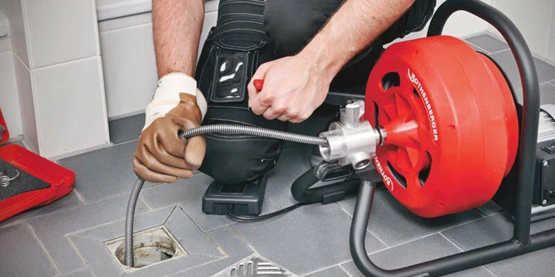 Drain cleaning service in Mableton, Georgia using professional plumbing equipment